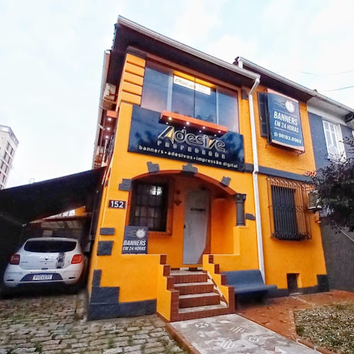 ADESIVE PROPAGANDA - BANNERS E ADESIVOS EM SANTOS